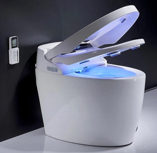 The Kushiro Smart Toilet lifting the lid and seat automatically with a subtle led light in the pan