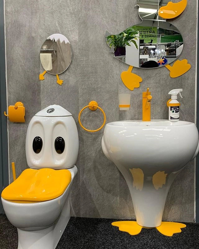 Picture of our Child Duck Bathroom Suite with Duck themes toilet, sink and mirrors.